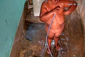 Hidden camera captures fat mommy milf bathing and showing big tits in the backyard!