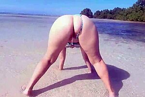 i love watching the chubby milf piss on her big fat ass at the beach