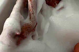 Beautiful Latina Enjoys Intimate Moment in Bubble Bath