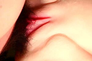 experience the slickness of a gorgeous woman's shaved close-up vagina