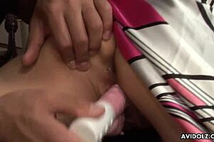 Filling up her pink gash with fingers and stimulating it with a toy.