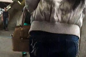 Hidden Nylon Ass in Jeans and Boots Caught on Train in Bold Street Action