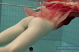 katya okuneva in red dress at the pool