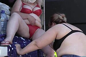 I watch mature lesbians with big asses outdoors in a public park, hidden camera capturing chubby milfs in sexy lingerie. Amateur fetish PAWG scene.