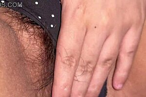 Indian girl teases her tight hairy pussy in solo homemade clip