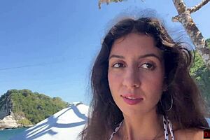 Hottie sucks dick on beach