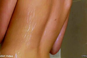 Emily Addison relaxes in a 4K shower, shaving her smooth skin beautifully.