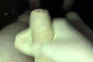 I'm stroking my big cock naked in the rain outdoors