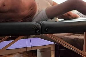 Bodybuilder Stretches Groin in Tight Spandex Shorts on Desk