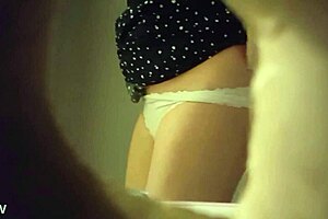 Hidden Cam Catches Sexy Babe in White Panties Peeing Through Wall Hole