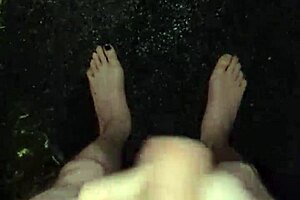 I'm stroking my big cock naked in the rain outdoors