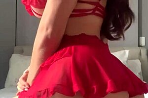 I'm a transsexual in fishnets, solo on a video call, stroking my cock and pussy