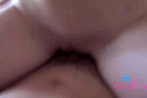 A guy relaxing when girl in stockings approaches