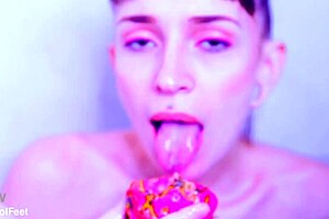 Bare toes crushing juicy fruit during solo masturbation.