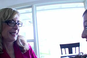 Mature woman and young girl in intimate encounter.