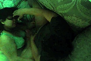 A wife secretly performs a blowjob on her husband using a hidden camera.