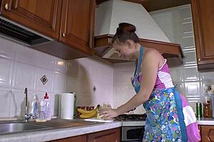 Brunette enjoys sucking a lollipop in high heels