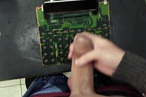 Skinny young masturbates huge cock on work machine POV