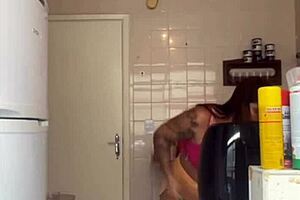 My husband caught me flashing while washing the balcony in my bikini, feeling exposed.