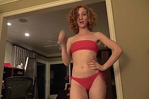 girl in red bikini shows off big ass