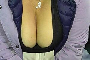 Acosando a madura venezolana culona en las calles de lima con hilo rojo parte 2, flashing big natural tits like a street whore.