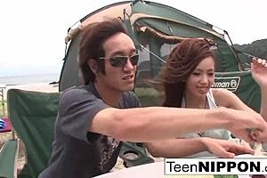 Japanese girlfriend gives outdoor blowjob to her guy