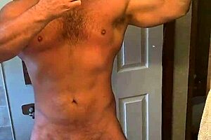 Muscular Man Flexes Big Dick and Cums on Mirror