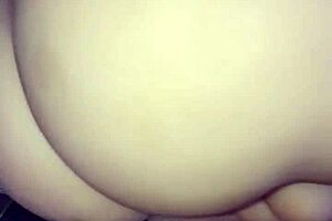 Enjoying the features of a sex toy doll.