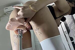 Asian mei feels her pussy drilled by dildo machine