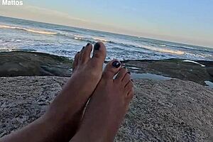 African babe shows off barefoot feet on public beach for fetish lovers