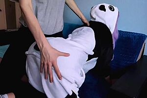 cute girl with purple hair enjoys the piercing and handjob session