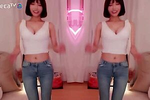 BJ Winter, the sexy Asian Korean, performs a seductive dance while teasing a blowjob.