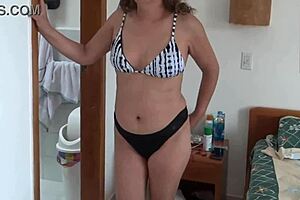 Mature Latina Flashes Bikini on Beach