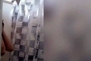 Cute latina showering