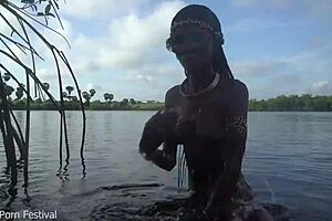 Hot skinny African village girl walks naked, seeking cock.