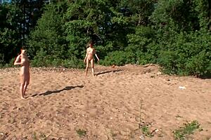 Four girls camp and play wild with each other.