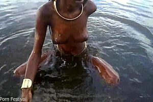 Hot skinny African village girl walks naked, seeking cock.