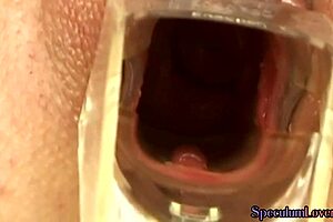 watch this pierced babe use a dildo to fuck her shaved pussy before revealing the insides