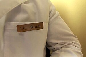 teen with black hair satisfies mall officer needs