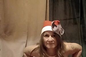 Housewife enslaved, performing kinky tasks with magic wand