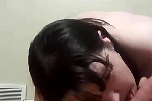 Slut fucks pussy while pulling leash