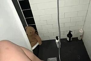 Arabian Snowwhite masturbates in the shower in Los Angeles.