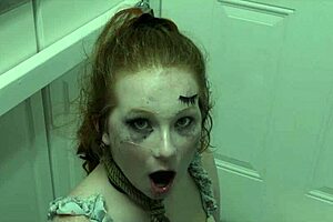 enthusiastic redhead slut licks cum from boot in bdsm humiliation