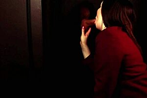 Student in stockings sucks cock at gloryhole and swallows cum