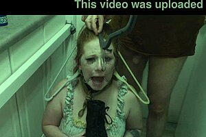 enthusiastic redhead slut licks cum from boot in bdsm humiliation