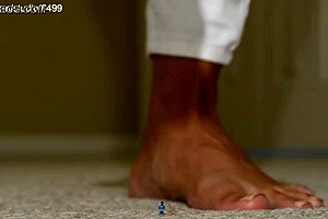 giant woman crushes small toys with feet
