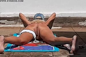 Blonde MILF flees as neighbor films her naked in yard