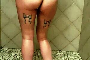 A sexy grandma moves her ass in the shower, showcasing sensual bathroom moments