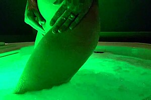 petite girl playing naked in hot tub!