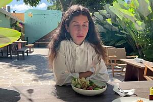 girl feels cum on her face in public cafe, eating lunch anyway.
